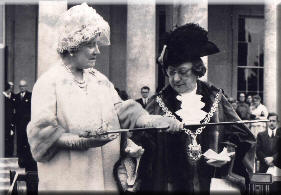 Her Majesty receiving the sword from the Mayoress